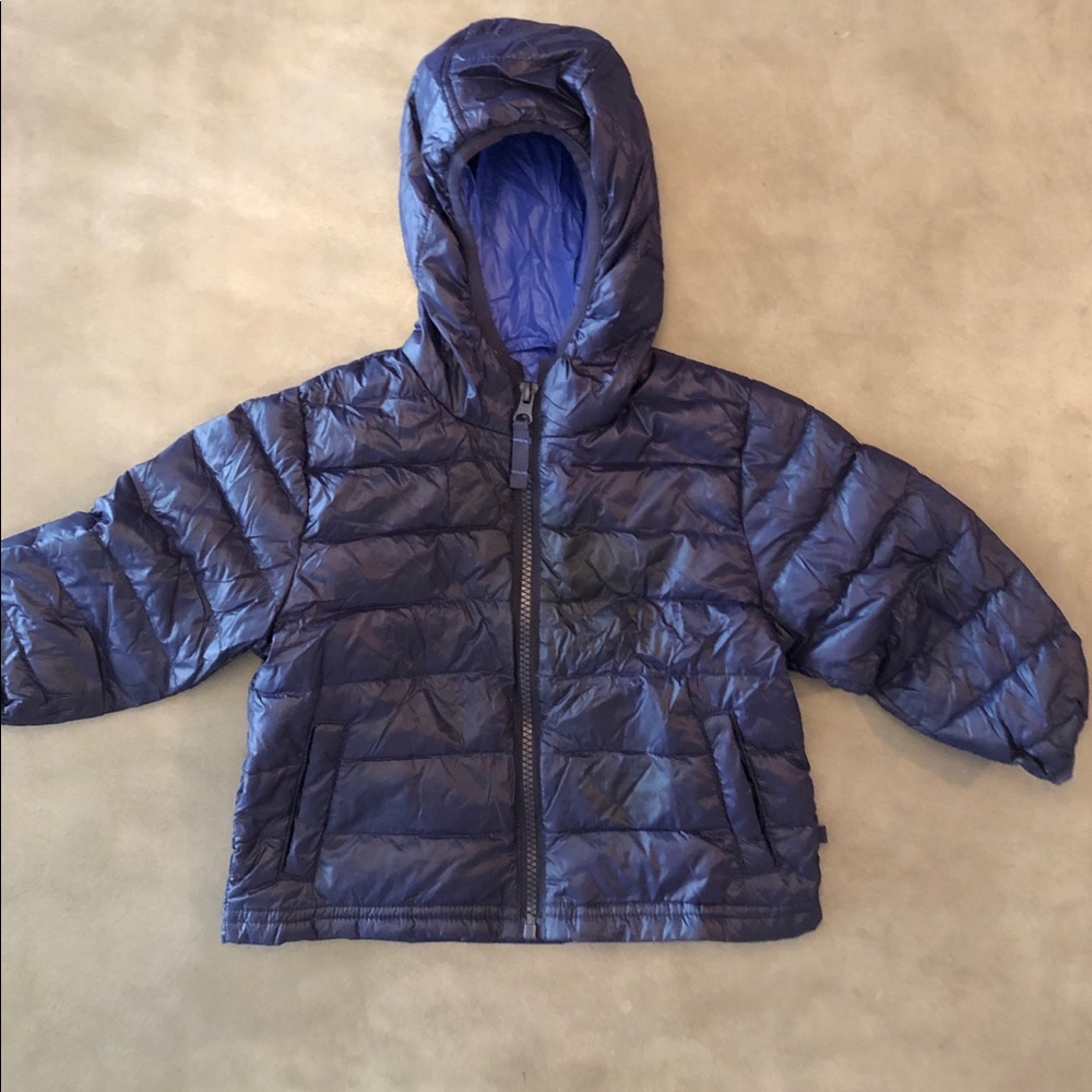 Blue quilted puffer coat with a hoodie